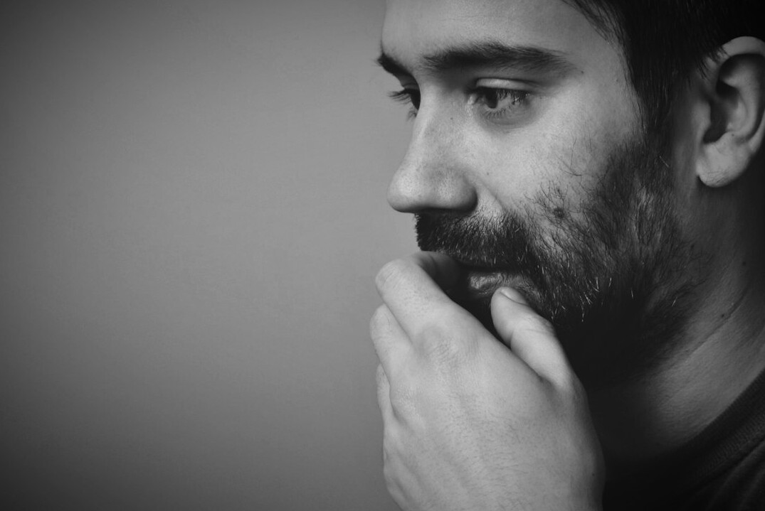 person thinking quietly